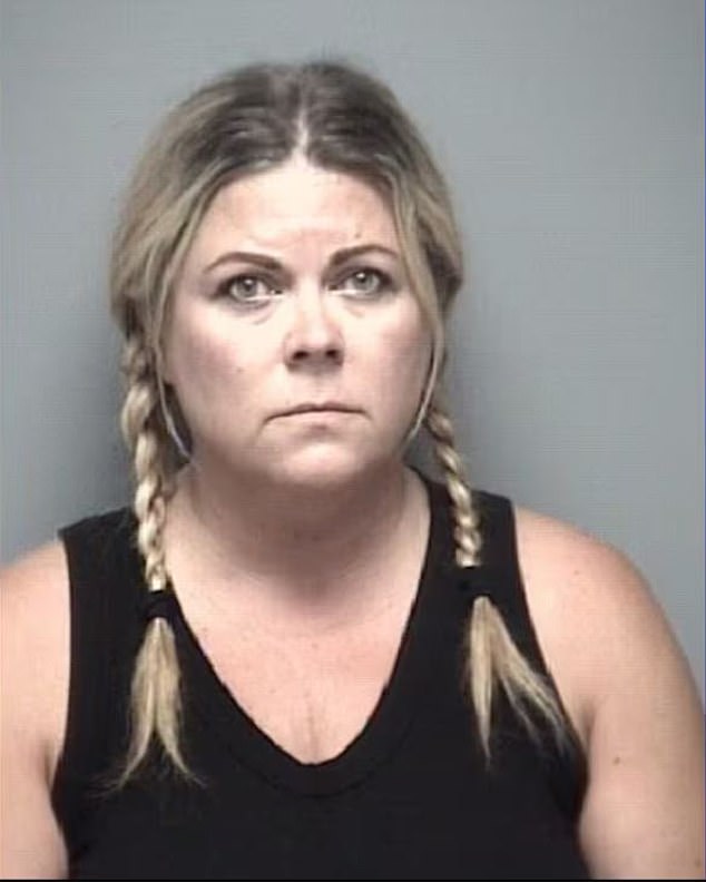 In her arrest photos, the mother of two wore a pair of pigtails as she remained in jail on Tuesday. It is unclear whether she is currently married, but her social media and public records suggest she was married just two years ago.