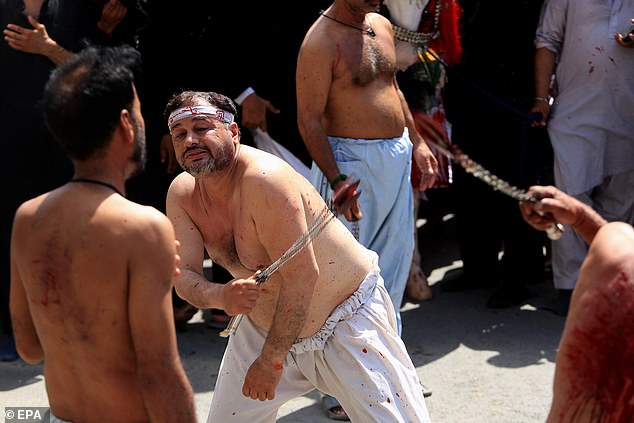 Many of the worshippers wear white clothes, which are then stained bright red by the blood flowing from head wounds and the flogging ceremonies