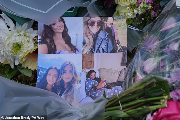 Photos of the victims were included among the floral tributes left at the scene of the murders