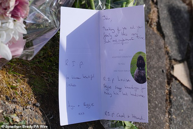 Handwritten condolences were placed on cards by well-wishers