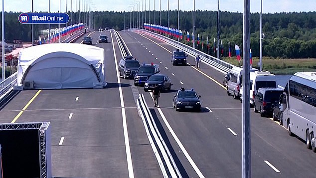 But as he swerves to drive to the right side of the road, he forgets to signal, causing his security vehicle behind him to nearly crash into the back of his Lada.