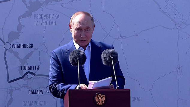 Putin addressed highway construction workers after the opening of the new section of the M-11 highway in Russia