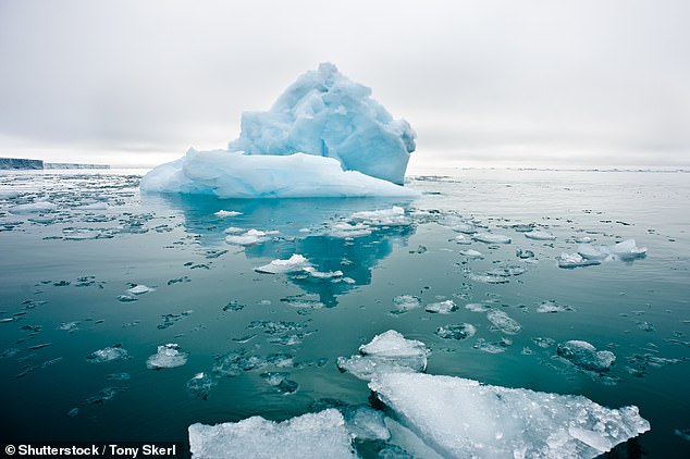 As the polar ice in Antarctica (pictured) and Greenland melts, fresh water flows toward the equator, disrupting Earth's balance and slowing the planet's rotation.