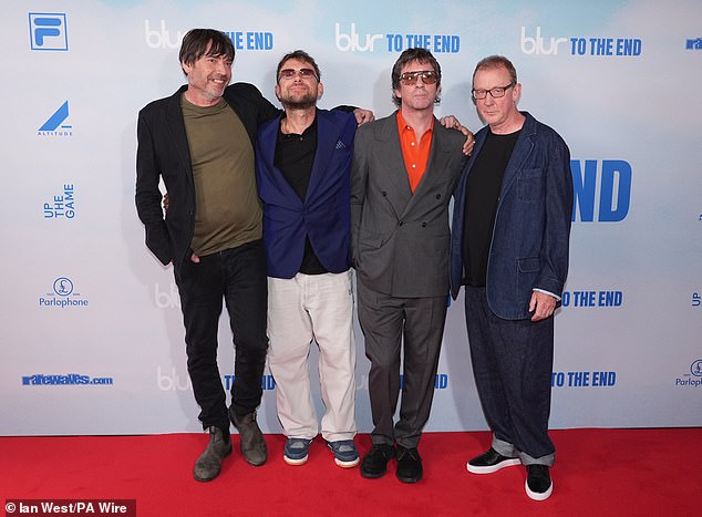 The band posed on the red carpet ahead of the release of their new feature film documenting their recent reunion