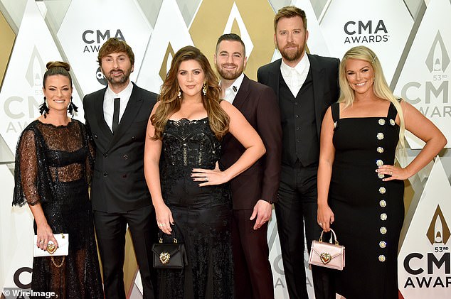 They announced the group's name change in 2020. The name was adjusted due to the word 'antebellum' and its association with slavery; Kelli, Dave, Hillary Scott, Chris Tyrrell, Charles Kelley and Cassie McConnell seen in 2019