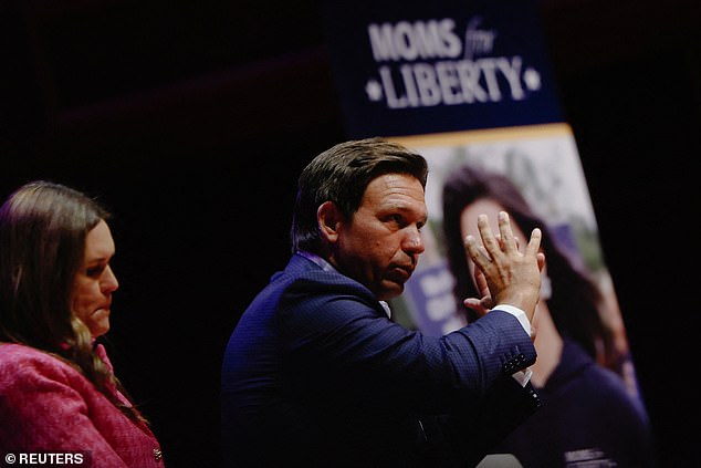 Florida Gov. Ron DeSantis attends a Moms for Liberty event in Milwaukee on Tuesday ahead of his speech at the party convention, as former President Donald Trump pushes to unify the party