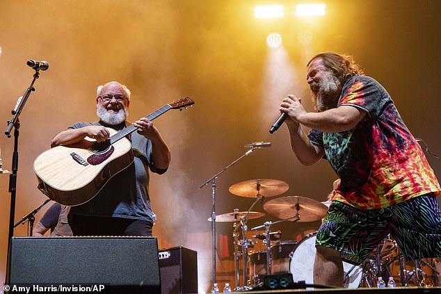 Kyle Gass' crude joke caused a rift in his relationship with Tenacious D frontman Jack Black (left and right)