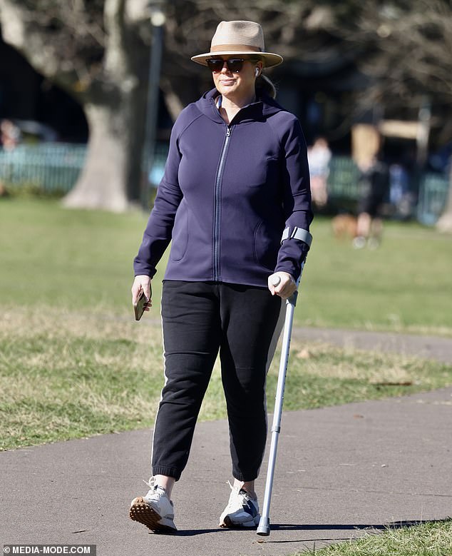 On Wednesday, Samantha flashed a smile as she walked through a Sydney park with the help of a metal hospital crutch