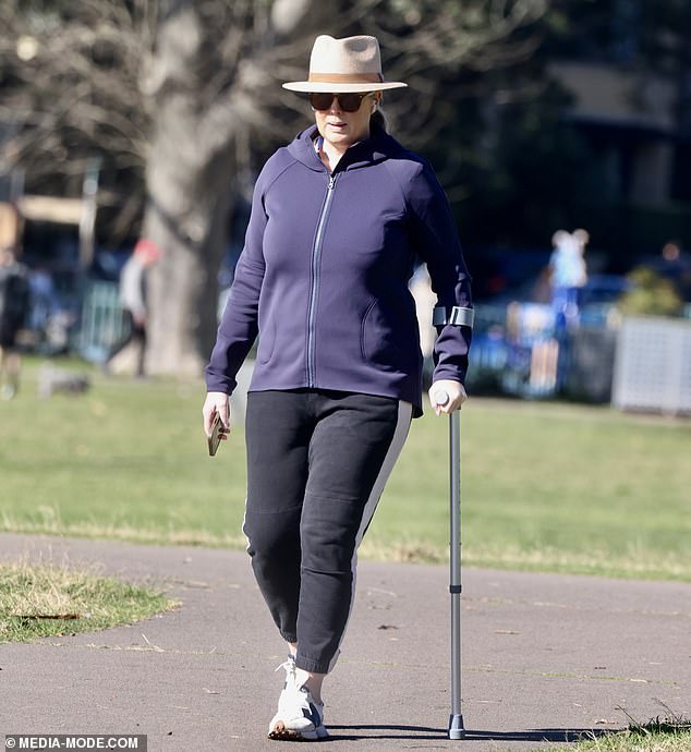 The TV presenter looked casual in black sweatpants and a navy zip-up jacket, which she paired with a brown wide-brimmed hat and sunglasses.