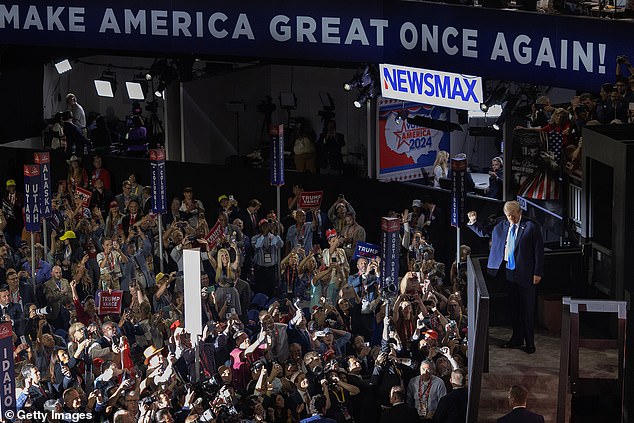 The audience burst into loud applause when he made his entrance