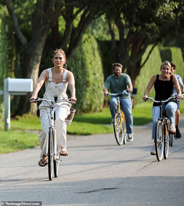 The 54-year-old actress took a bike ride in New York's Hamptons on Tuesday while her husband Ben was back in LA amid rumors of an impending divorce.