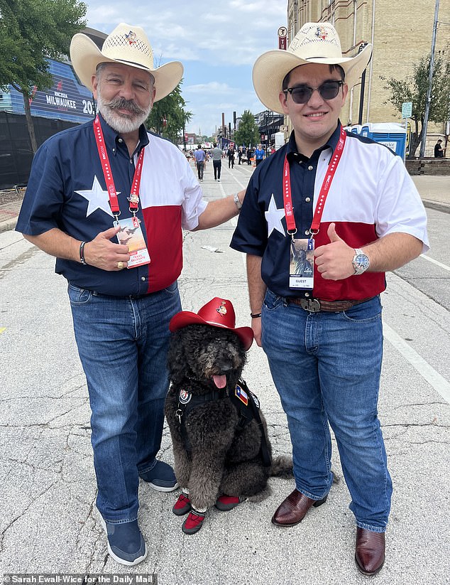 Representative Albert Herrera and his son Yosef Herreraw with goldendoodle Tzeitel