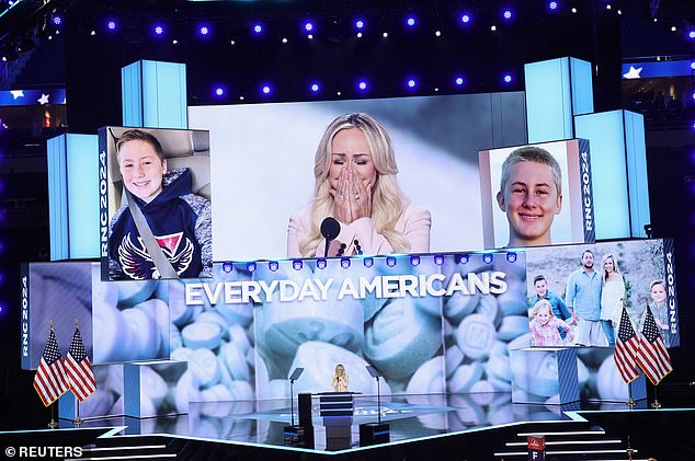 Funder on stage with images of her son Weston behind her