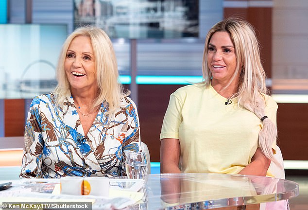 Katie said: 'I'm not happy right now, I have another operation next week. My mum says I have body dysmorphia' (pictured with her mother in 2019)