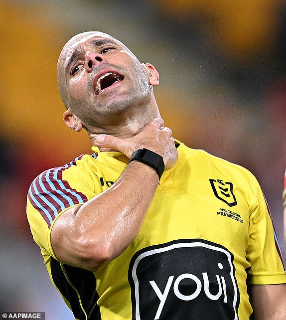 Referee Ashley Klein refers to a high tackle on the Dolphins' Herbie Farnworth during the NRL Round 10 match between the Redcliffe Dolphins and the Manly Warringah Sea Eagles at Suncorp Stadium in Brisbane, Thursday, May 9, 2024. (AAP Image/Dave Hunt) NO ARCHIVING, FOR EDITORIAL USE ONLY