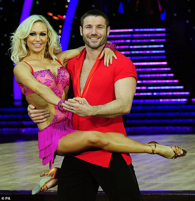 In an interview with Lorraine on Wednesday, Kristina said that during her time on the show, the screening process for the experience and character of potential professionals was strict (Kristina pictured with her former celebrity partner and current fiancé Ben Cohen in 2014)