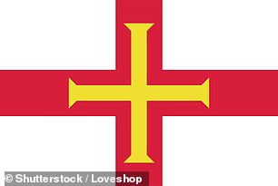 The photo shows the flag of Guernsey, with a red St. George's Cross containing a gold Norman cross.