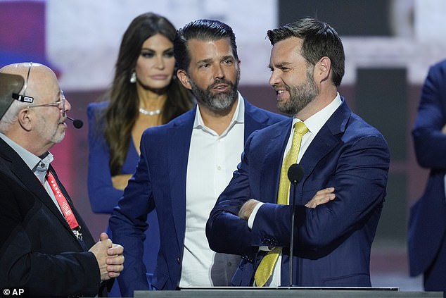 Sen. J.D. Vance prepares to speak Wednesday night after being announced as Trump's running mate. He is seen here with Donald Trump Jr. and Kimberly Guilfoyle