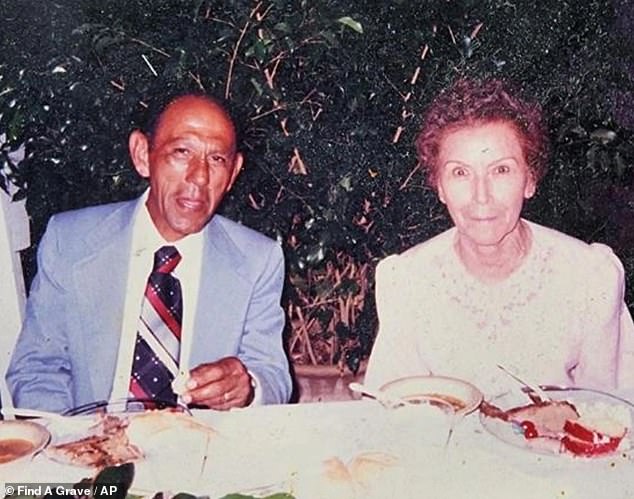 Gutierrez was convicted of the 1998 murder of Escolastica Harrison, pictured here next to her husband at a family wedding