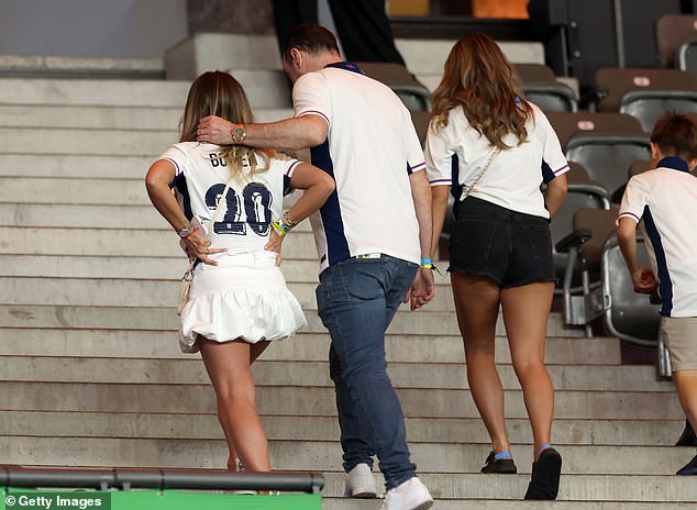 After the loss, Dani was comforted by her father, actor Danny, who put his arm around her when she started crying as they left the stadium