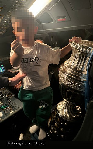 Cristian Romero posted a photo of his child holding the trophy in the cockpit of a plane