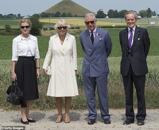 Then-Prince Charles and then-Duchess Camilla are shown around by the Duke and Duchess of Wellington during a visit to the Battlefield and Lion Hill in Belgium in 2015