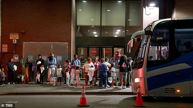 Dozens of migrant families arrive at the Port Authority Bus Terminal in New York from Texas in September 2023.