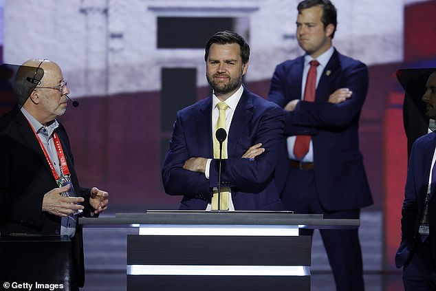 Vance will address delegates Wednesday night. He is seen here during a walkthrough on Tuesday, surveying the podium and lectern in the Fiserv Forum