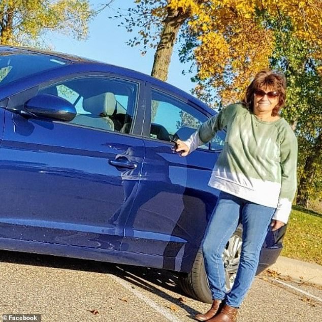 Walters poses next to her new car shortly after purchasing it