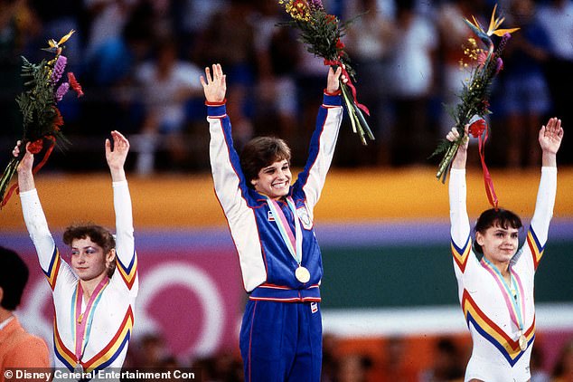 Retton tops the podium ahead of Romanian gymnasts Ecaterina Szabo and Simona Pauca