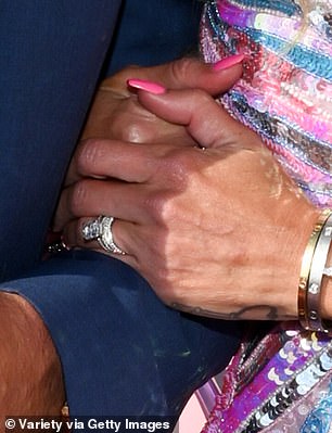 The star is seen wearing her wedding rings in July 2023