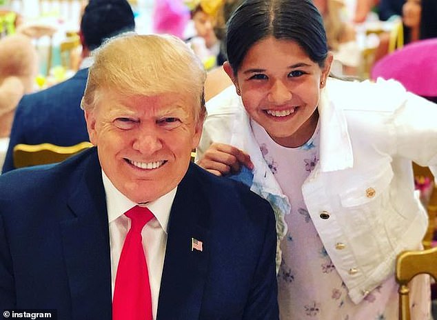 Kai poses for a photo with her grandfather during his time as US President