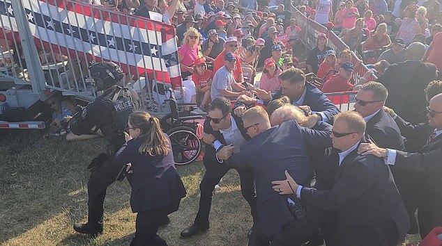 New footage shows Secret Service protecting Trump as he escorts him out of meeting