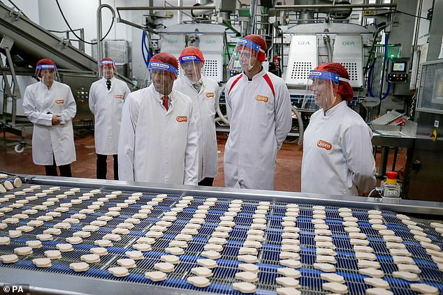 Former Prime Minister Rishi Sunak views the production line during a visit to Quorn's HQ