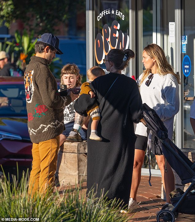 The Australian actress revealed her unlikely friendship with Entourage star Adrian Grenier as they enjoyed a get-together in the seaside town