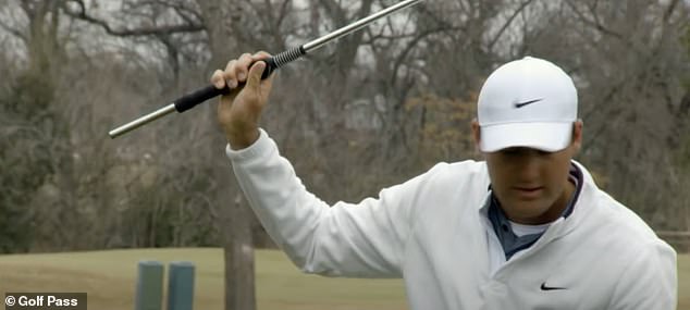 The American here shows how the grip is attached to the club and presents a wide area where players can place their thumb on the grip