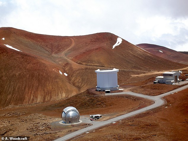 Photograph of the James Clerk Maxwell Telescope on Mauna Kea, Hawaii (center). On the left is the Caltech Submillimeter Observatory, and on the right is the Smithsonian Submillimeter Array.