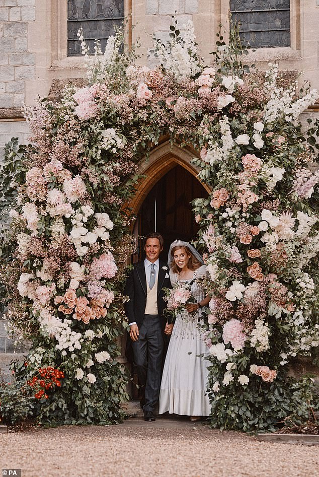 Beatrice and Edoardo stand in the doorway of The Royal Chapel of All Saints in Royal Lodge