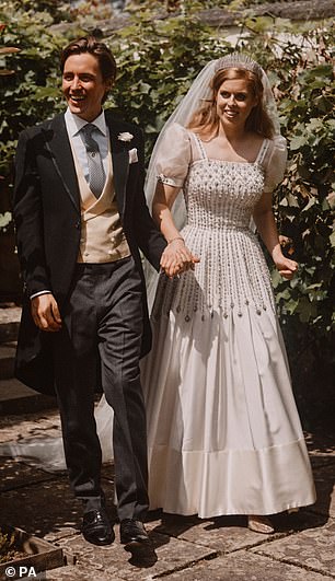 For her big day, Beatrice wore a vintage Norman Hartnell dress and the Queen Mary Diamond Fringe Tiara, borrowed from her late grandmother, Queen Elizabeth II.