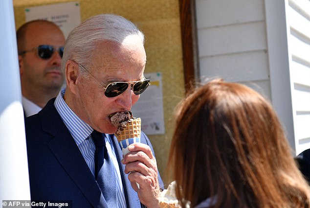 Biden is pictured above enjoying an ice cream cone in Cleveland, Ohio, in May 2021.