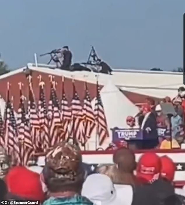 A Secret Service counter sniper unit can be seen on the roof behind Trump, it is believed this team returned fire on Crooks after he fired at Trump. The roof they were deployed on also clearly has a slope which can be seen in this image