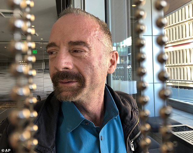 Timothy Ray Brown poses for a photo, Monday, March 4, 2019, in Seattle. Brown, also known as the 