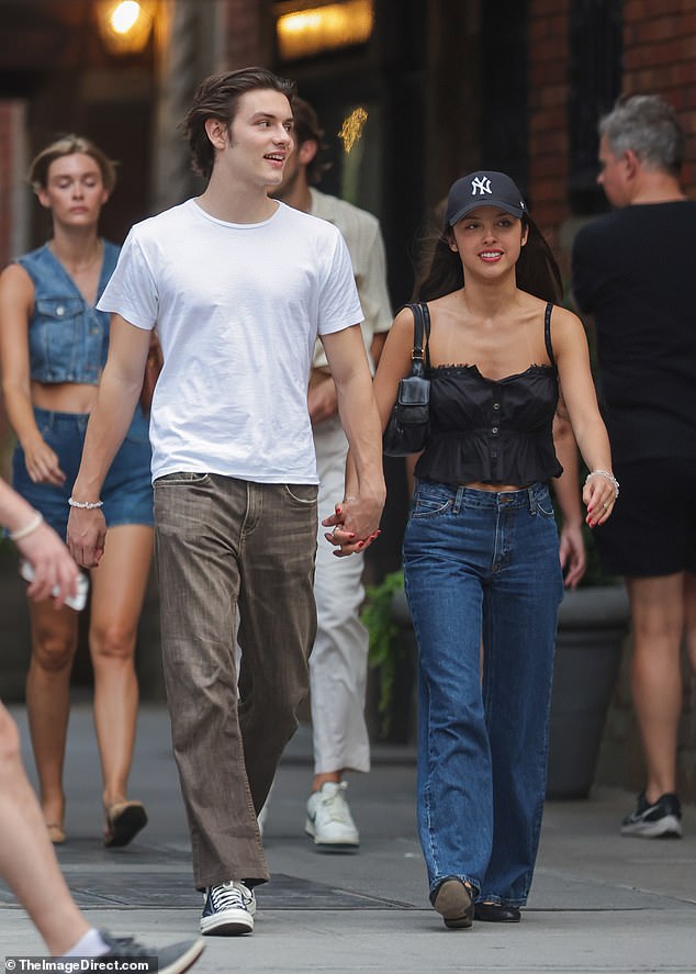 The 21-year-old pop star and the 21-year-old English actor walked hand in hand through the Big Apple