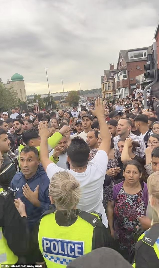 Large crowds gathered at the scene as police officers dealt with a disturbance at a property in Luxor Street, Harehills, Leeds at 5pm