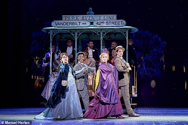 Theatre production Hello, Dolly! at the London Palladium. Pictured: Emily Lane, Tyrone Huntley, Jenna Russell and Harry Hepple