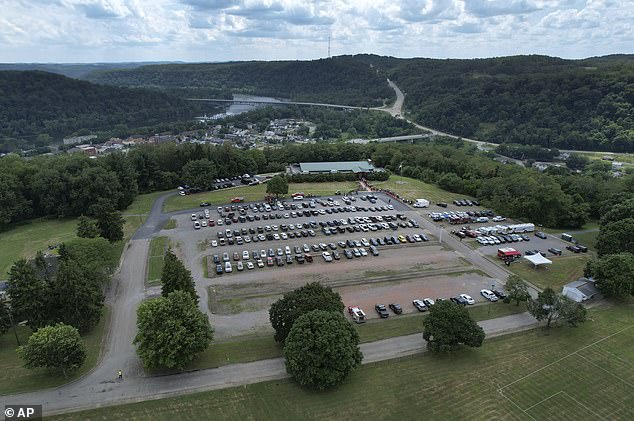 Vehicles are parked during a visit to Corey Comperatore at Laube Hall, Thursday, July 18, 2024, in Freeport, Pennsylvania