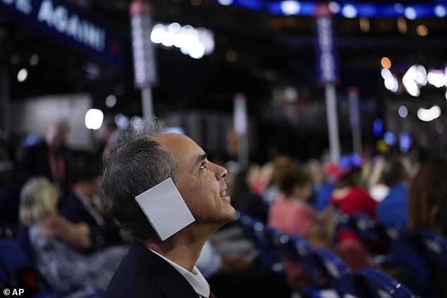 I met Joe Neglia (pictured), a delegate from Arizona who had a white envelope taped to his right ear.