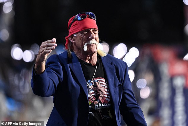 Hulk Hogan waves to the crowd as he makes his debut at the Republican National Convention in Milwaukee on Thursday night