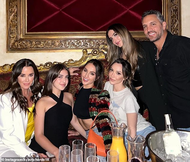 Kyle and Mauricio pictured with their three daughters Alexia, 27, Sophia, 24, and 16-year-old Portia, as well as Kyle's eldest daughter Farrah, 35