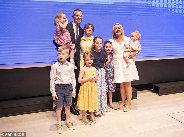 Dominic Perrottet is pictured with his family